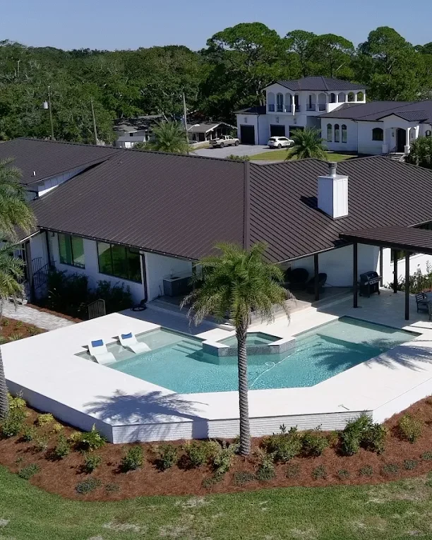 Aerial view of a Whitrock Associates metal roof on a Northwest Florida waterfront home